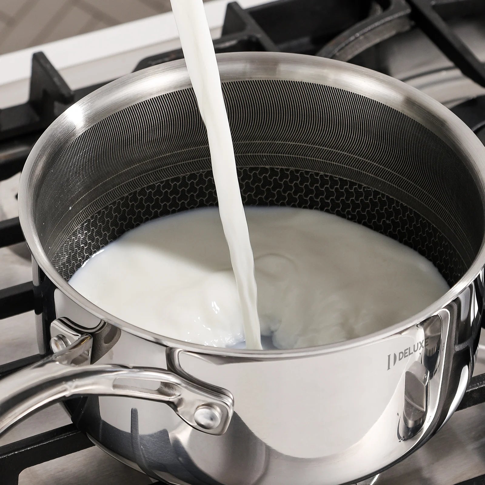 3 qt sauce pan pouring milk